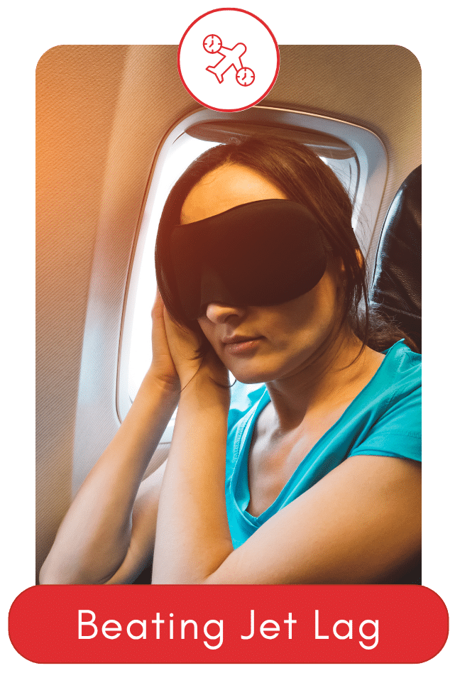 Woman wearing a sleep mask on an airplane, resting to reduce jet lag.