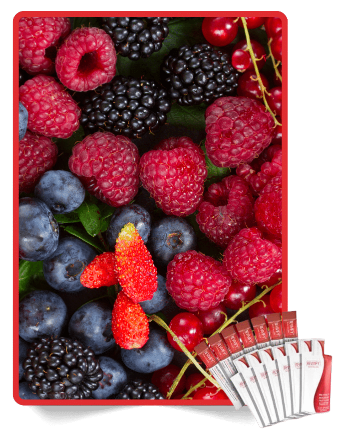 Mixed berries including blueberries and raspberries with Revivify supplement packets supporting your wellness checklist.