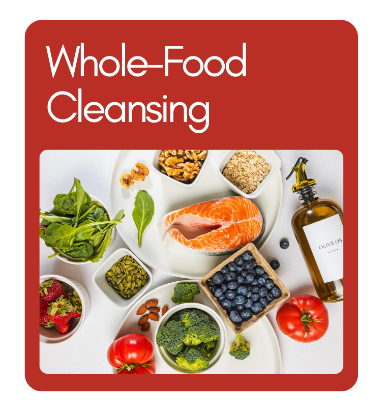 Whole-Food Cleansing Ingredients - Revivify For Life fiber foods including leafy greens, salmon, berries, and olive oil on a plate